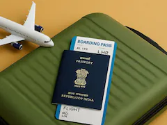 Budget traveler packing bags